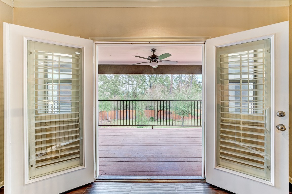 7938 Wooded Way Drive Spring, TX 77389 - Photo 27 of 47 The Game room French doors open to the upstairs balcony!