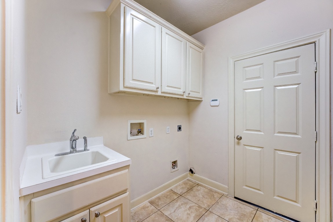 7938 Wooded Way Drive Spring, TX 77389 - Photo 29 of 47 Plenty of extra cabinets in Laundry room just outside the kitchen