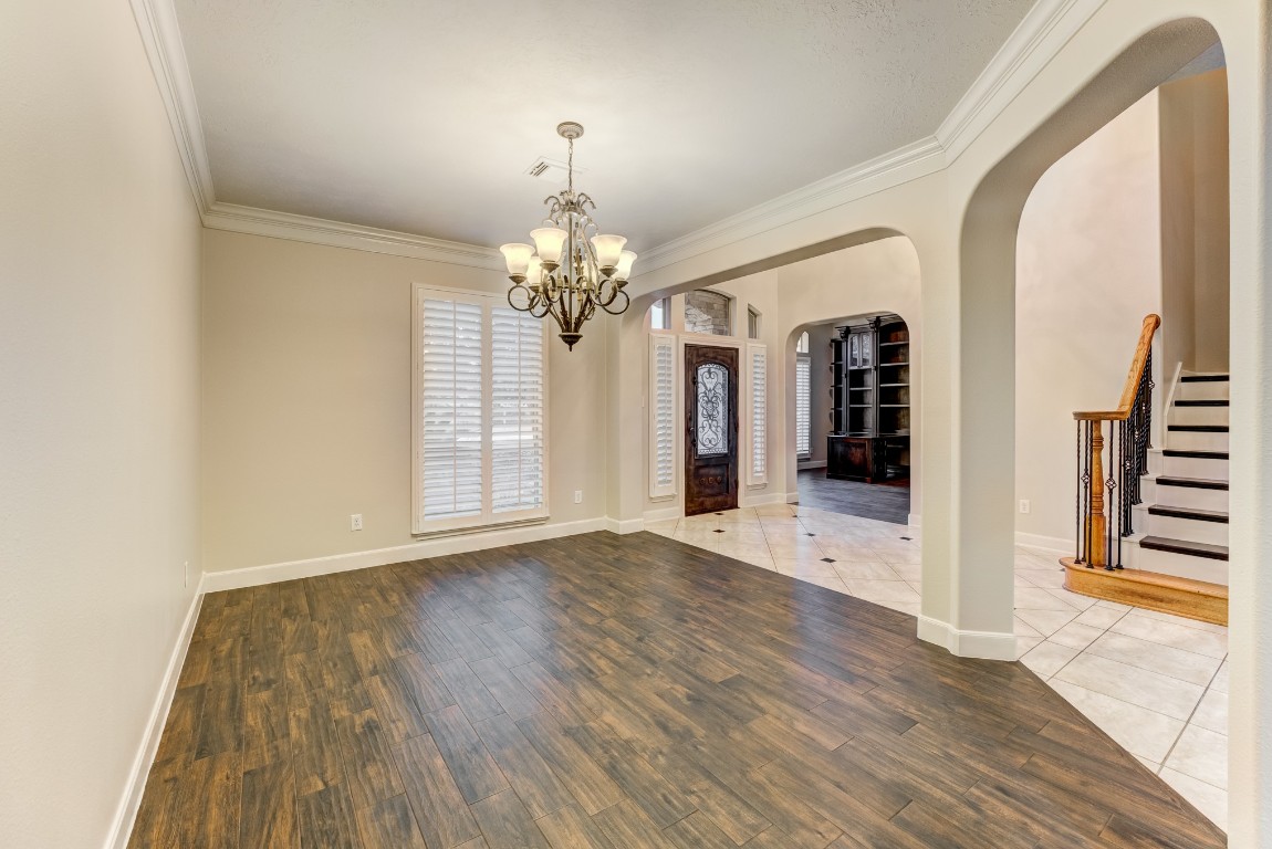 7938 Wooded Way Drive Spring, TX 77389 - Photo 6 of 47 The formal dining room showcases gleaming wood floors