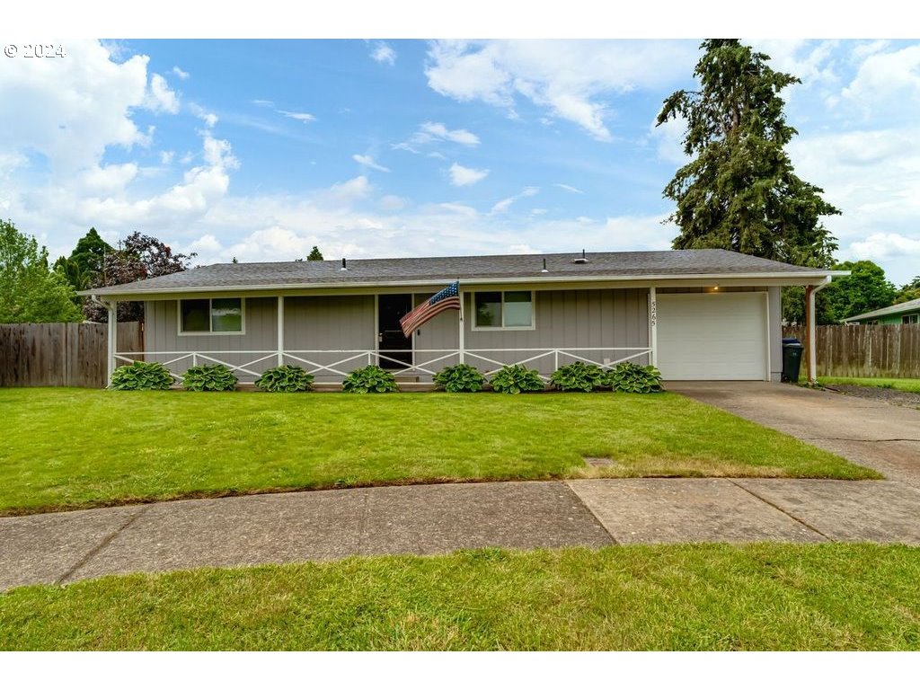 5265 F Street Springfield, OR 97478 - Photo 1 of 17 a front view of house with yard and green space