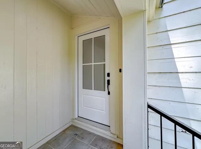 a bathroom with a shower and a sink