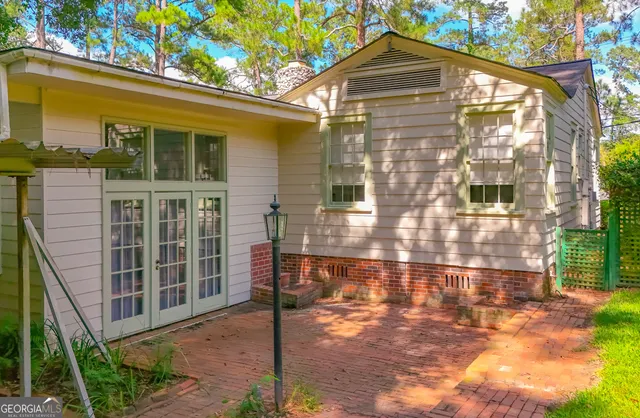 a front view of a house with glass windows