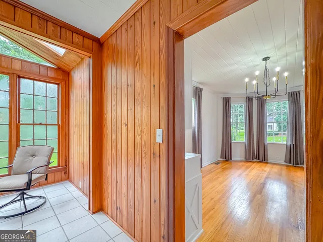 a kitchen with a sink a counter top space and stainless steel appliances