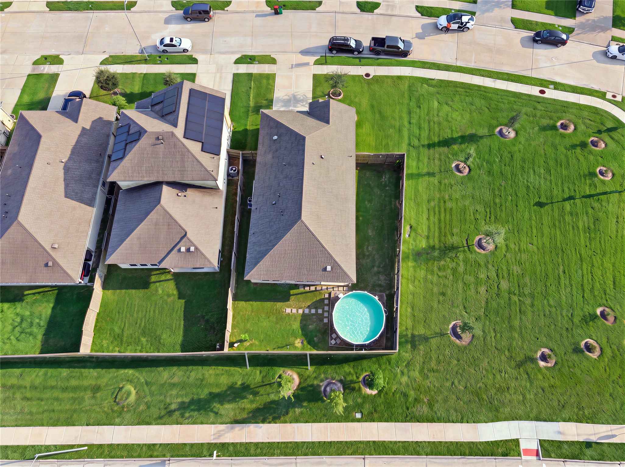 815 Barstow Drive Rosharon, TX 77583 - Photo 22 of 23 Overhead aerial view highlighting the home’s lot, above-ground pool, and added privacy with no side or rear neighbors.