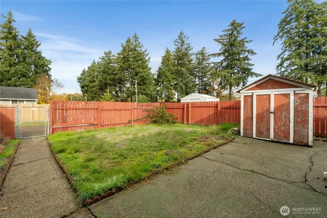 a view of backyard with green space