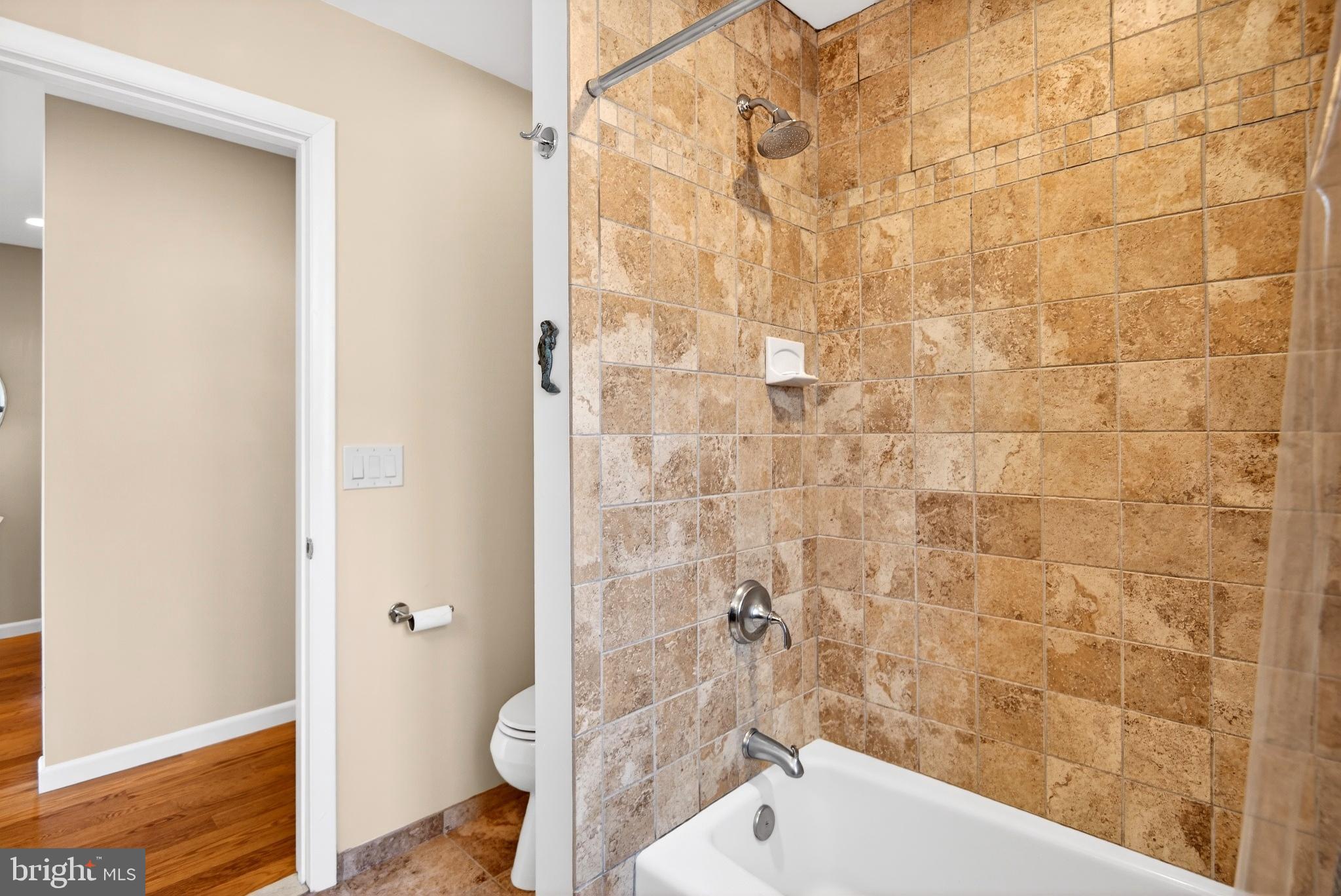 20 Edgewater Drive Tuckerton, NJ 08087 - Photo 47 of 78 Elegant bathroom with natural stone tiles.