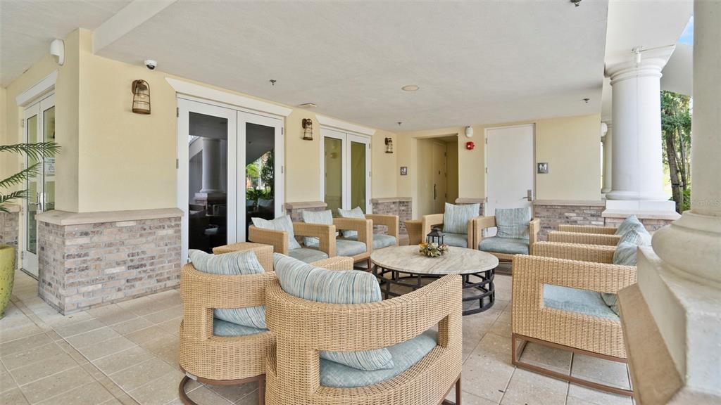 7855 Poplin Street Kissimmee, FL 34747 - Photo 15 of 15 a dining room with furniture a large window and a rug