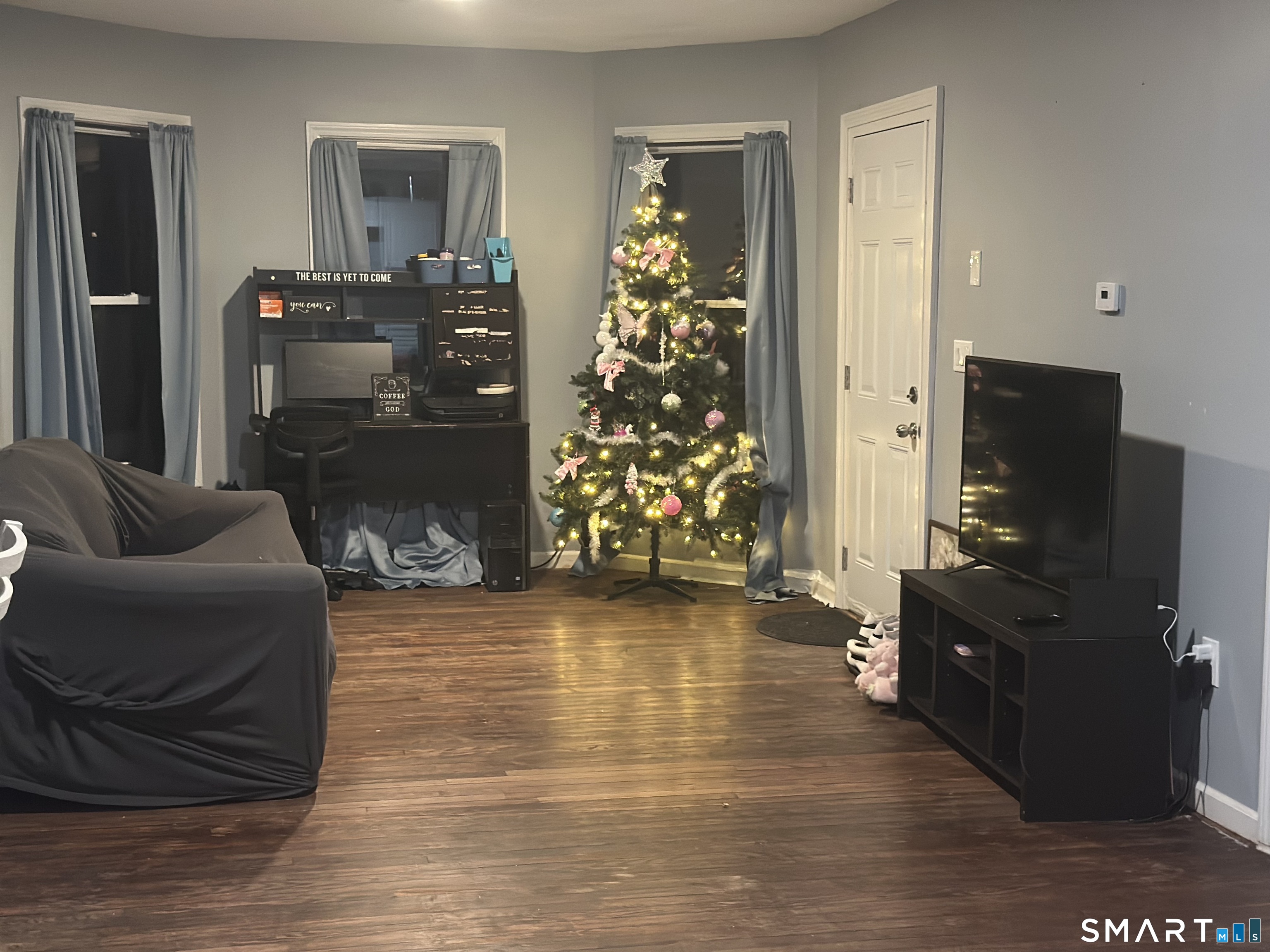253 Riverside Avenue Torrington, CT 06790 - Photo 11 of 15 a living room with furniture and a fireplace