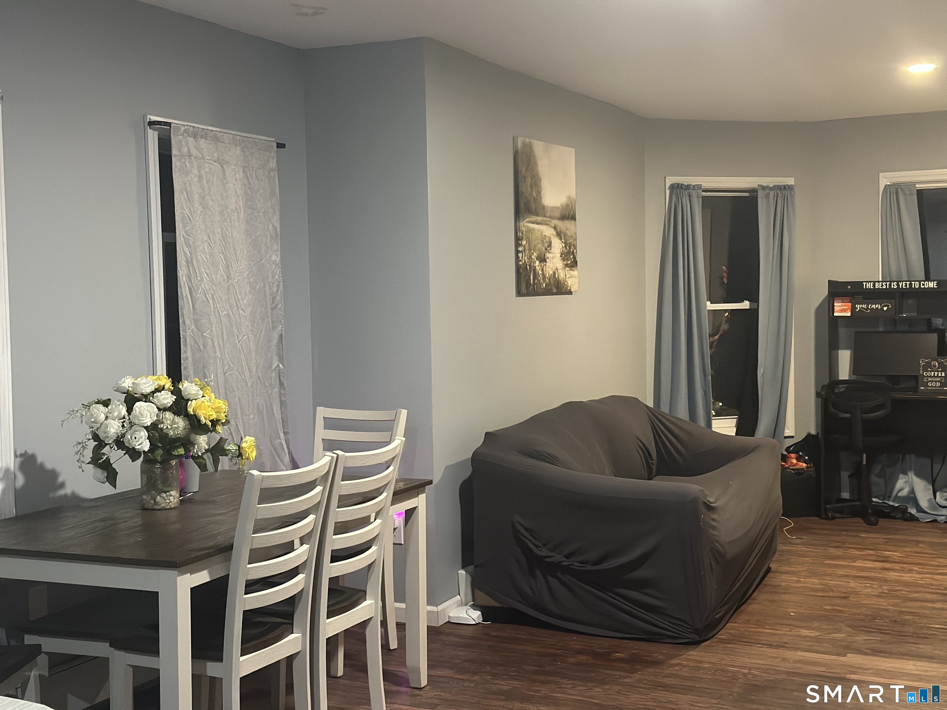 253 Riverside Avenue Torrington, CT 06790 - Photo 12 of 15 a living room with furniture and flowers