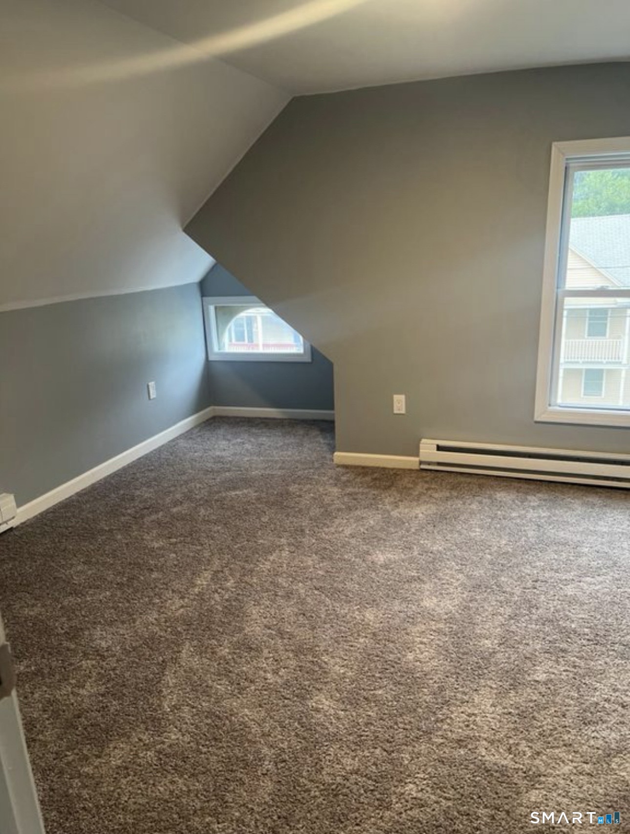 253 Riverside Avenue Torrington, CT 06790 - Photo 7 of 15 a view of an empty room and window