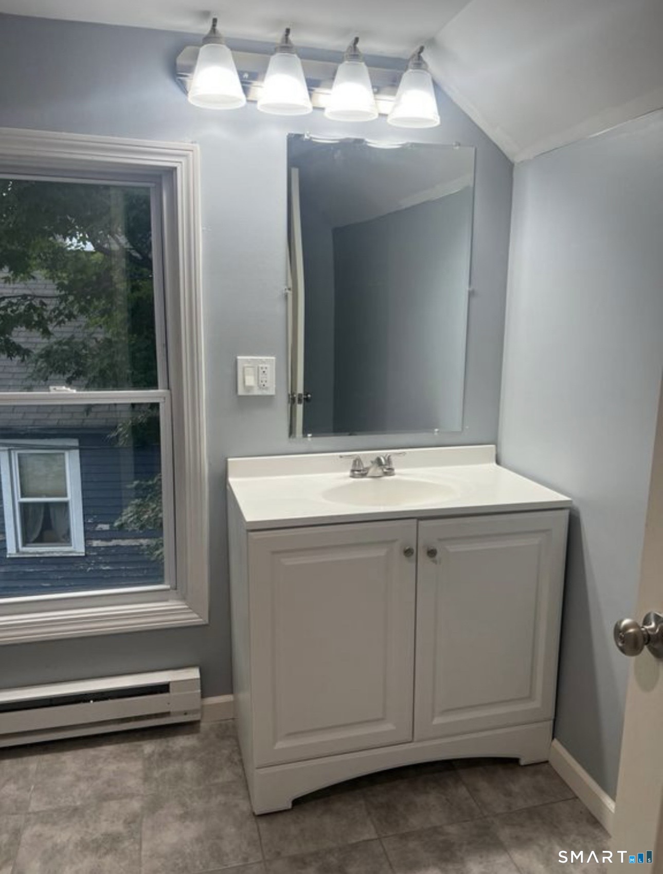 253 Riverside Avenue Torrington, CT 06790 - Photo 8 of 15 a bathroom with a sink and mirror