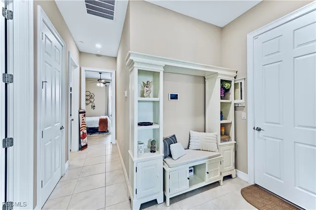 a view of a bedroom with a walk in closet and bedroom