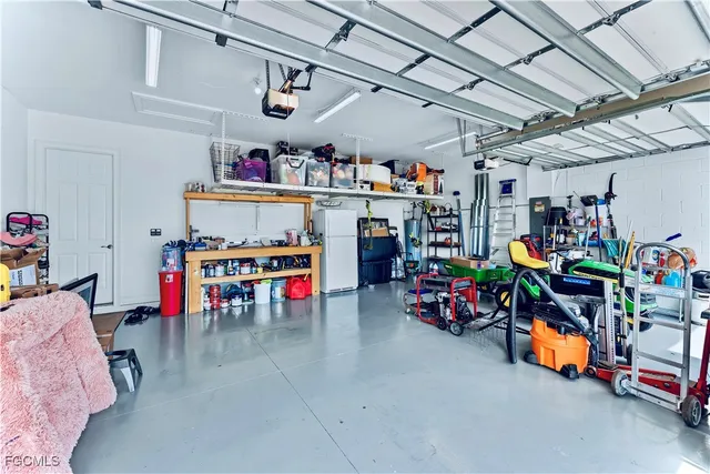 a garage with a table and chairs