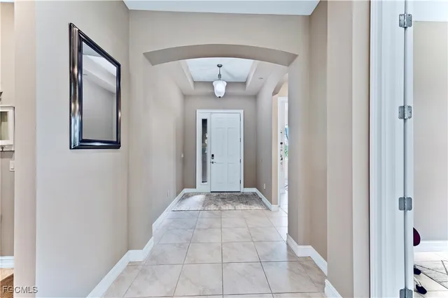 a view of a hallway with a bathroom