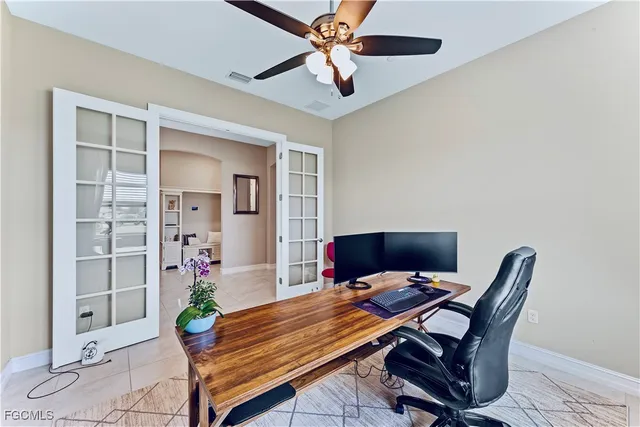 a view of a workspace with furniture