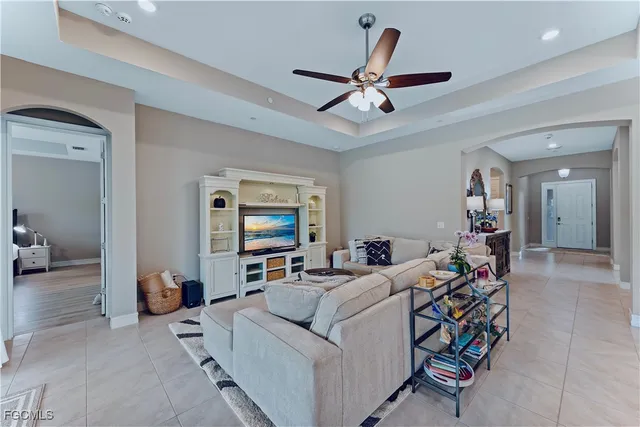 a living room with furniture and white walls