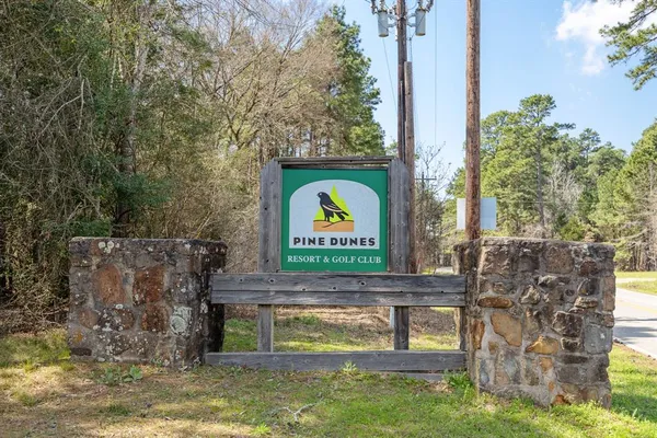 swimming pool with outdoor seating and yard