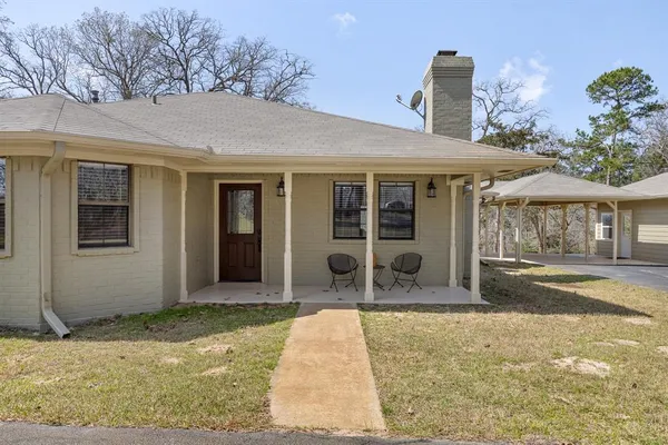 a house with yard in front of it