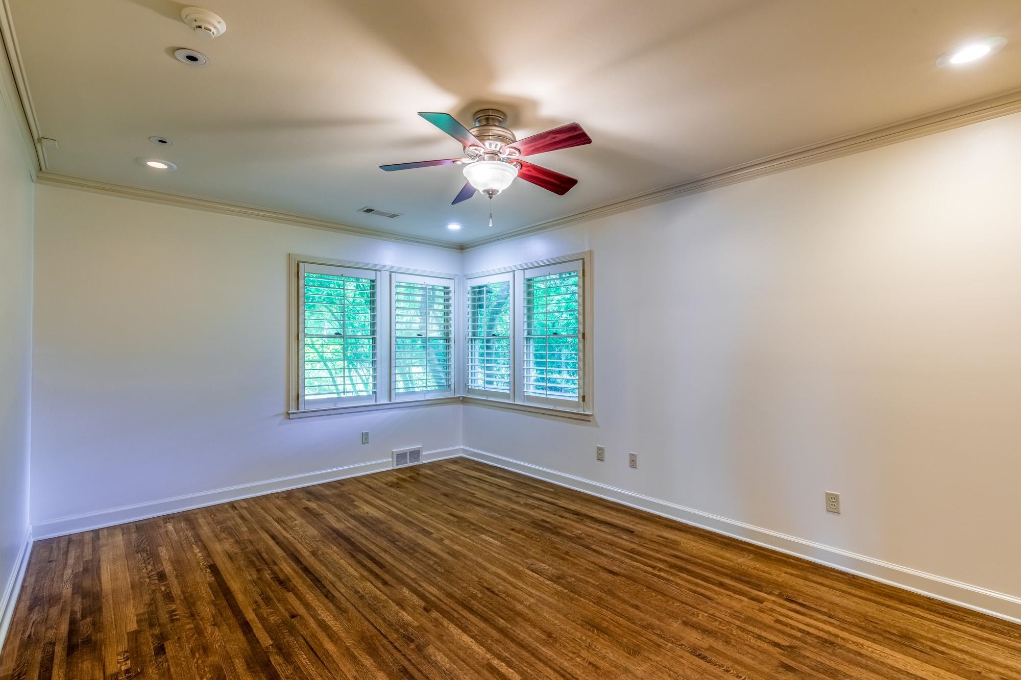4174 Minden Road Memphis, TN 38117 - Photo 13 of 24 a view of an empty room with window and chandelier fan