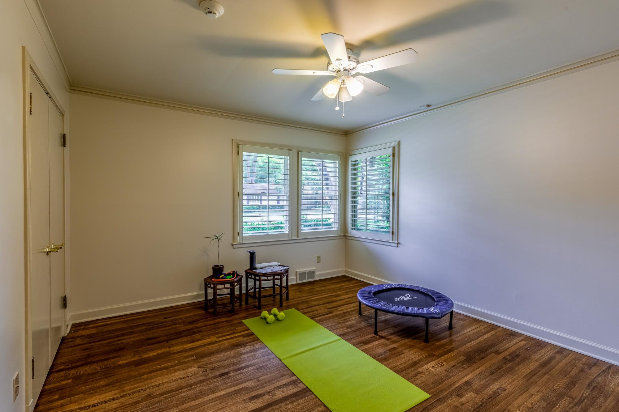 4174 Minden Road Memphis, TN 38117 - Photo 17 of 24 a spacious bedroom with a bed and a chandelier