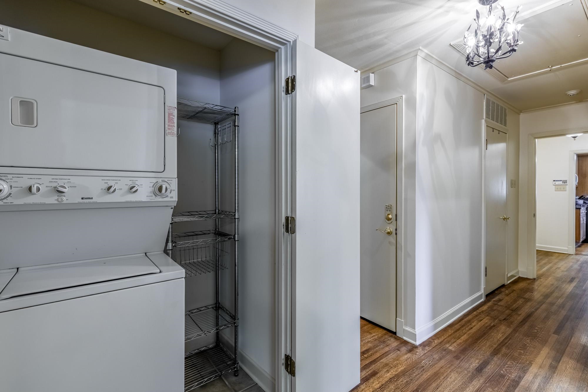 4174 Minden Road Memphis, TN 38117 - Photo 19 of 24 a view of a hallway with a washer and dryer