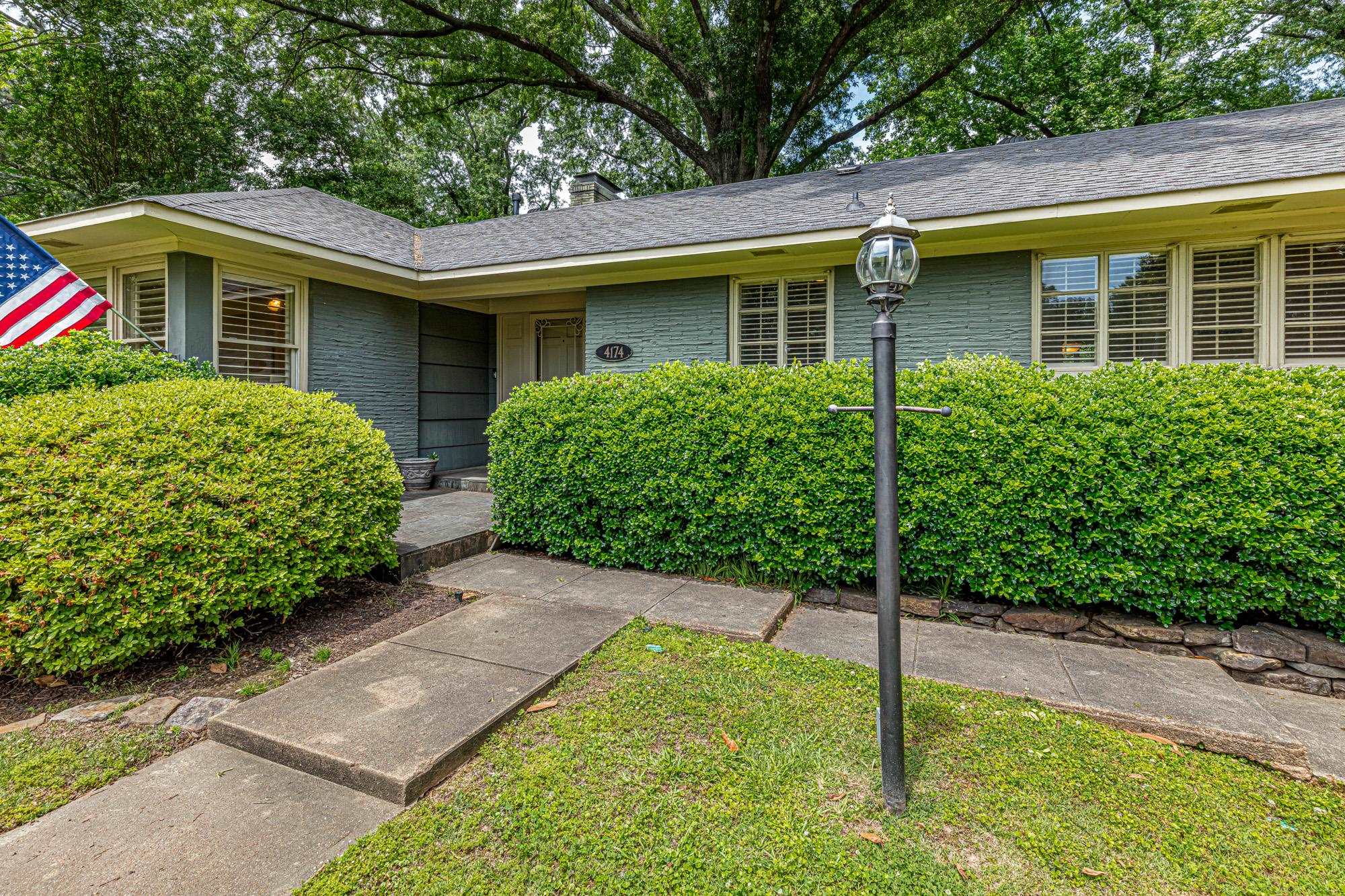 4174 Minden Road Memphis, TN 38117 - Photo 2 of 24 a front view of a house with a yard