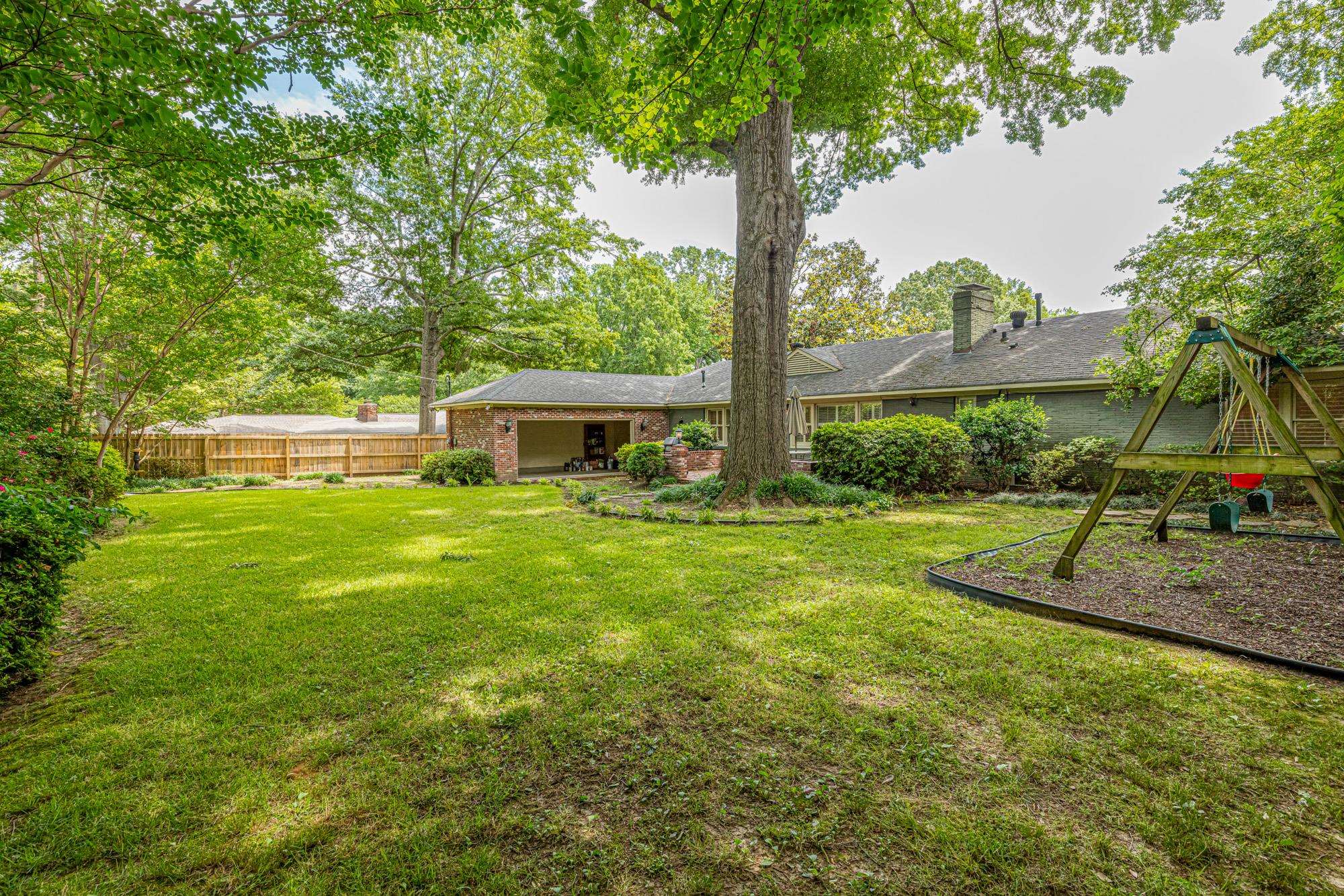 4174 Minden Road Memphis, TN 38117 - Photo 23 of 24 a front view of house with yard and green space