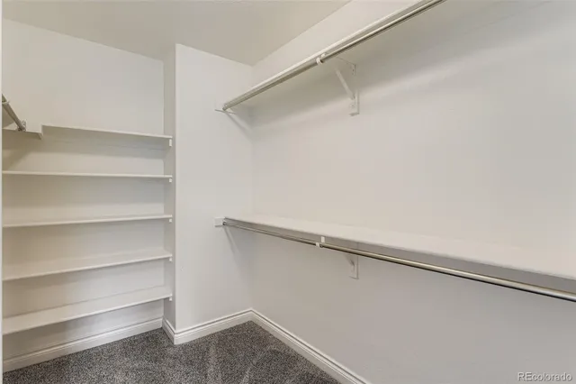 a view of an empty walk in closet