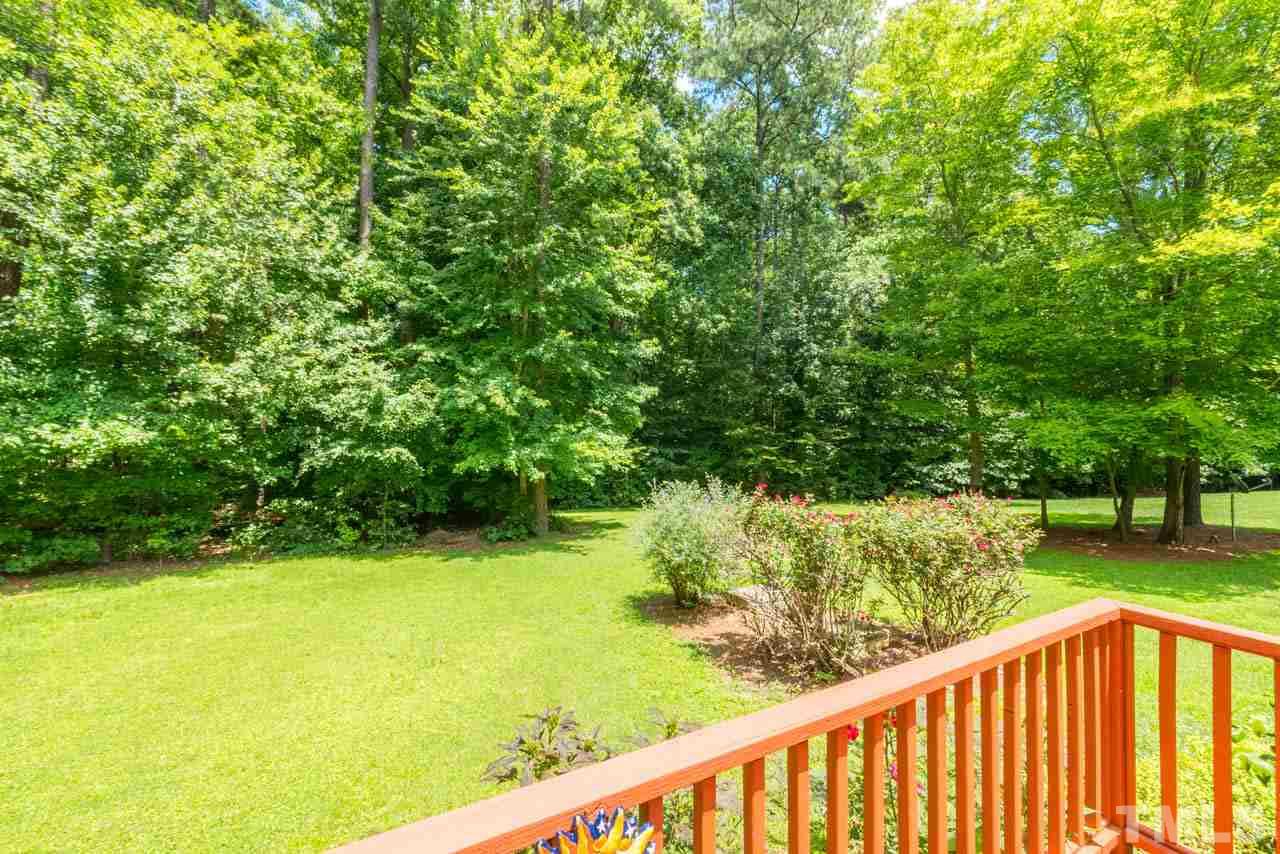 9512 Ray Road Raleigh, NC 27613 - Photo 22 of 25 a view of a balcony with an outdoor space