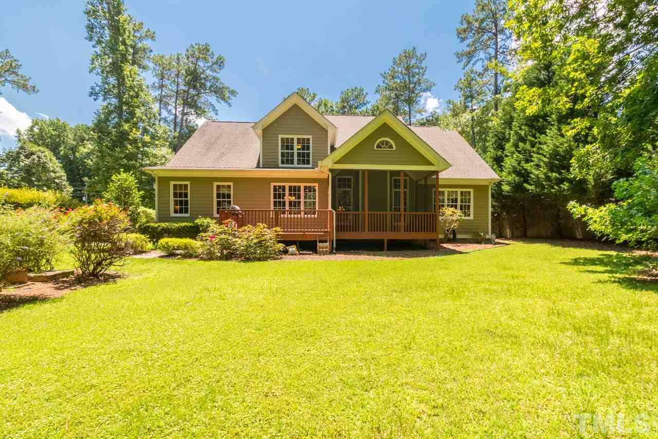 9512 Ray Road Raleigh, NC 27613 - Photo 23 of 25 a front view of a house with swimming pool