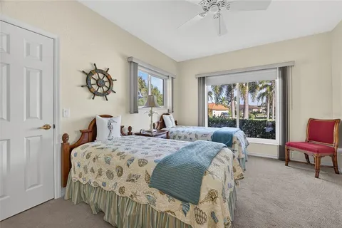 a utility room with cabinets washer and dryer