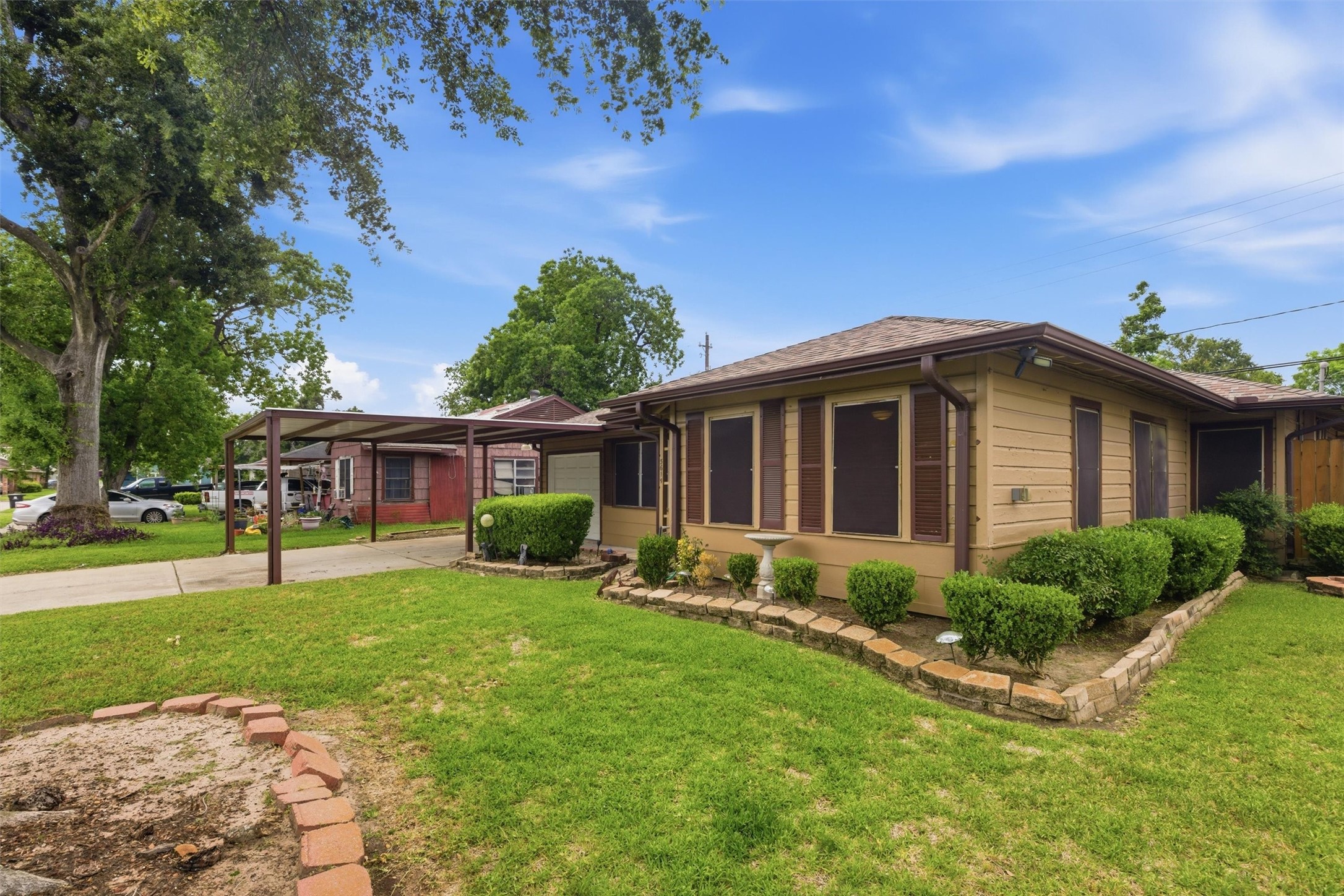 3615 Alberta Street Houston, TX 77021 - Photo 2 of 16 a view of a house with a yard