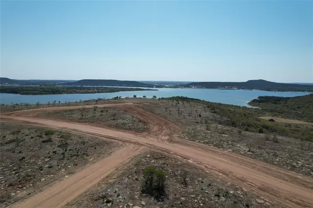 a view of a beach with a mountain