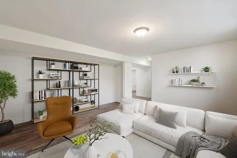 a living room with furniture and furniture