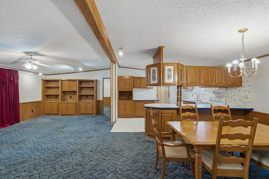 220 North Houston Street Edgewood, TX 75117 - Photo 17 of 30 a view of a dining room with furniture