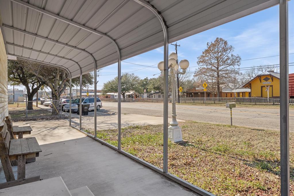 220 North Houston Street Edgewood, TX 75117 - Photo 25 of 30 a view of a porch