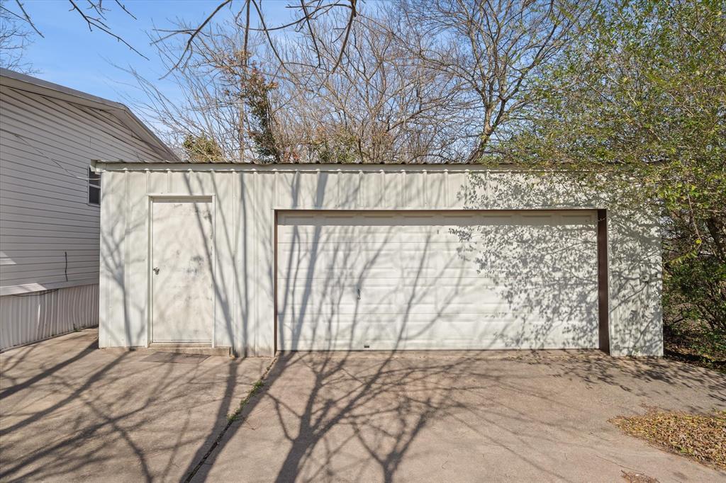 220 North Houston Street Edgewood, TX 75117 - Photo 27 of 30 a view of entrance gate of a house
