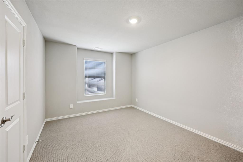 1721 Arches Road Anna, TX 75409 - Photo 31 of 39 a view of an empty room with a window