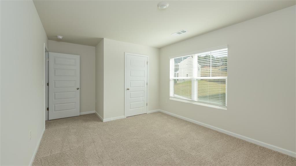 1949 Van Alen Court Dacula, GA 30019 - Photo 38 of 46 an empty room with a window
