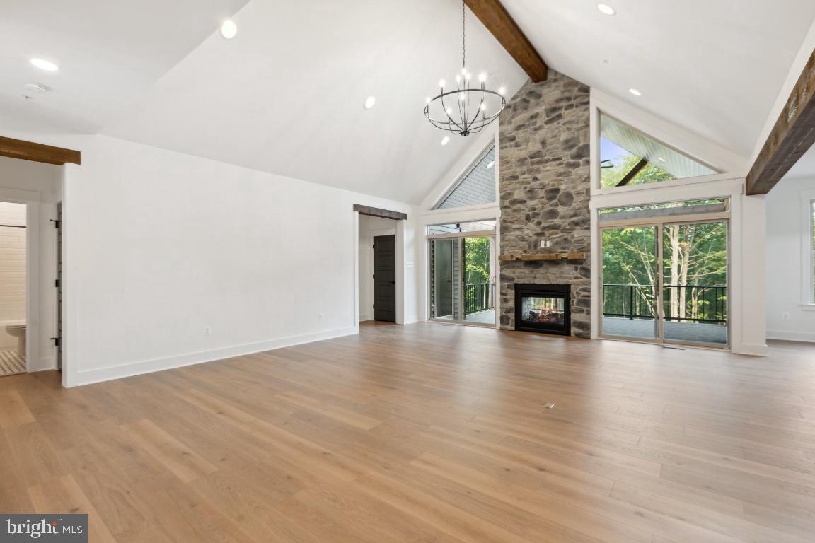 3110 Thurston Road Frederick, MD 21704 - Photo 8 of 38 Beautiful 2-story stone fireplace.