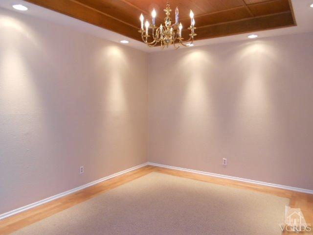 2201 Vina Del Mar Oxnard, CA 93035 - Photo 22 of 48 a view of an empty room with chandelier and a window