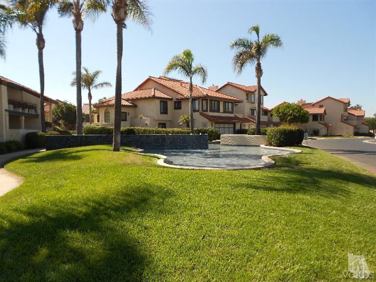 2201 Vina Del Mar Oxnard, CA 93035 - Photo 41 of 48 a front view of house with yard and swimming pool