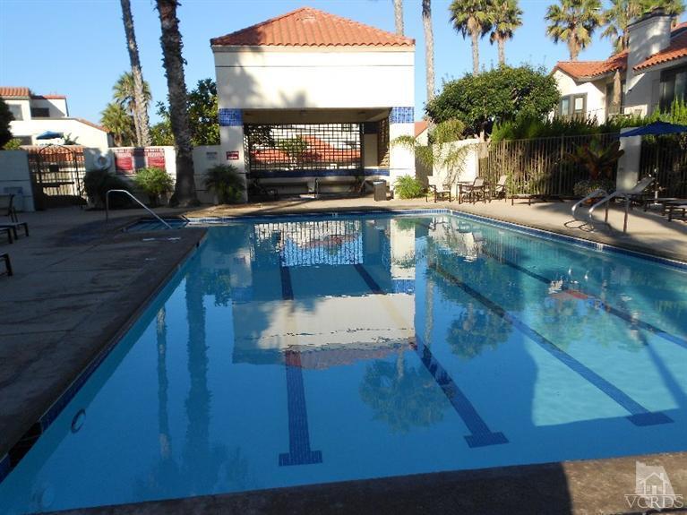2201 Vina Del Mar Oxnard, CA 93035 - Photo 44 of 48 a view of a swimming pool with outdoor seating