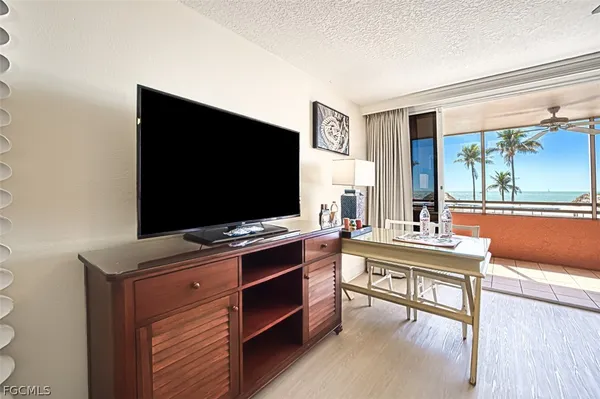 a kitchen with stainless steel appliances granite countertop a sink stove and microwave