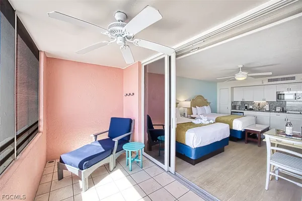 a bathroom with a granite countertop sink a mirror and a shower