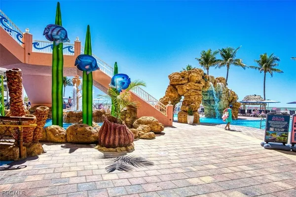 a group of cars parked in front of house