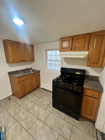 a room with furniture and a window