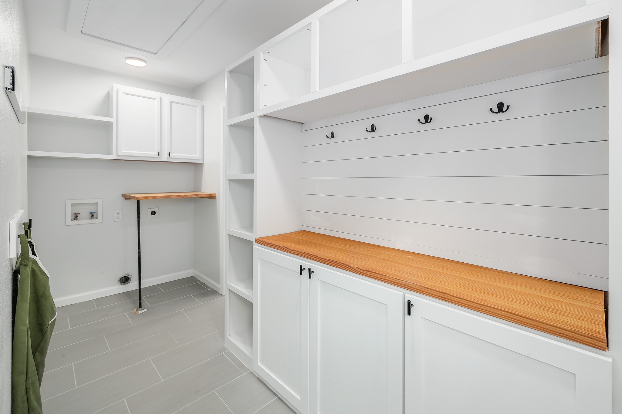 9614 Chukar Circle Austin, TX 78758 - Photo 22 of 26 Even the laundry room is updated with tastefully refined finishes and functional design.