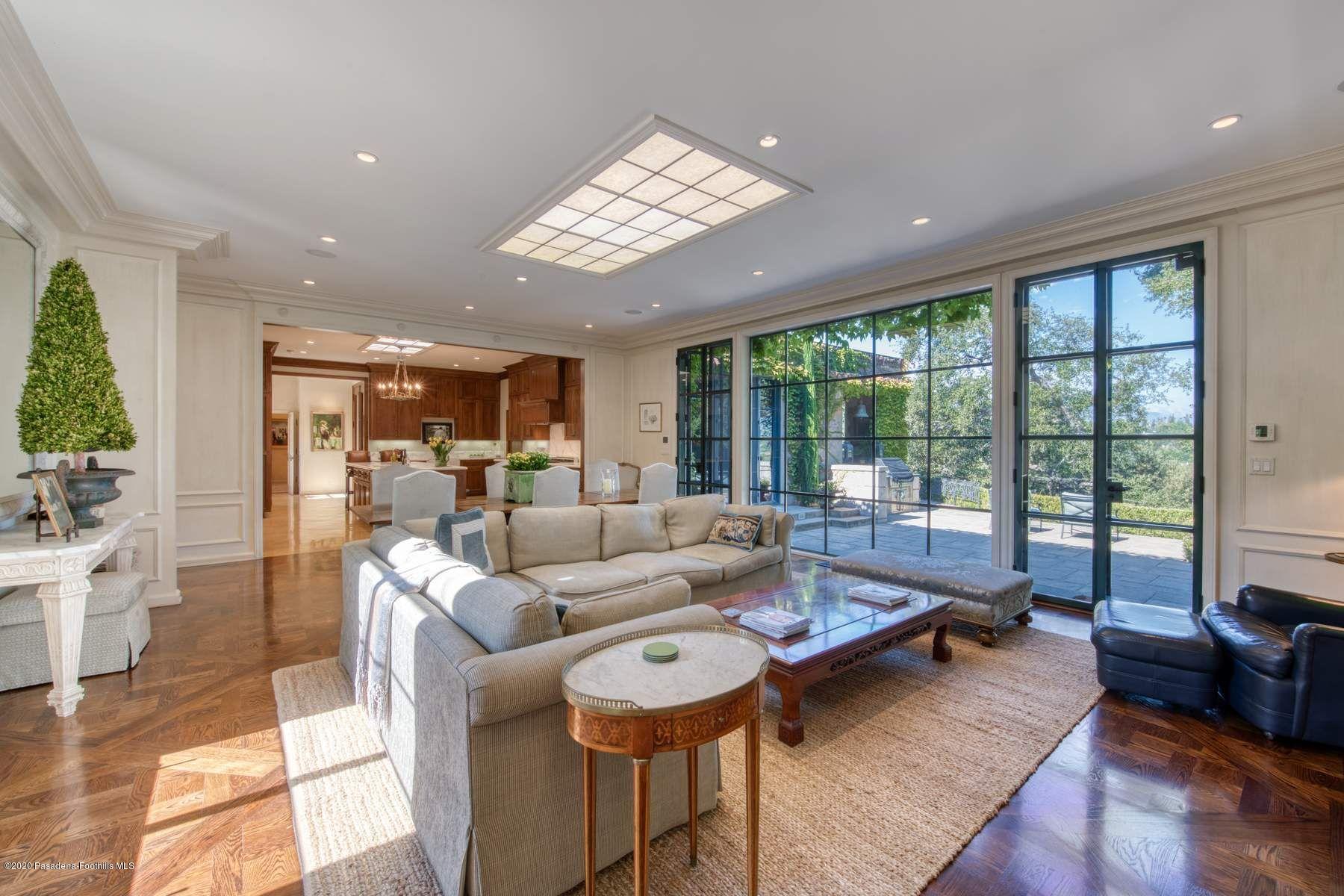 400 South San Rafael Avenue Pasadena, CA 91105 - Photo 14 of 49 a living room with furniture and a large window