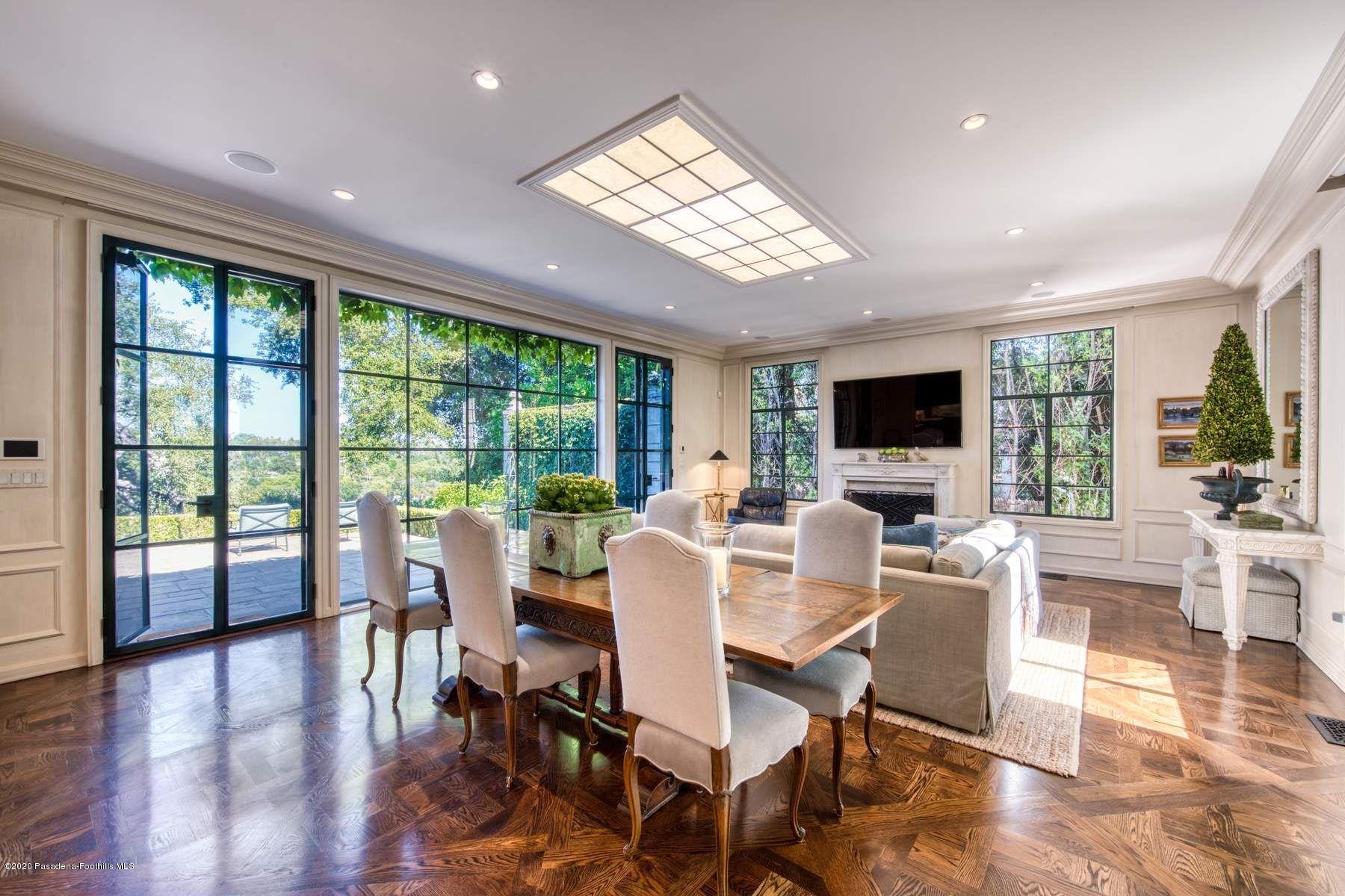 400 South San Rafael Avenue Pasadena, CA 91105 - Photo 16 of 49 a view of a dining room with furniture window and wooden floor